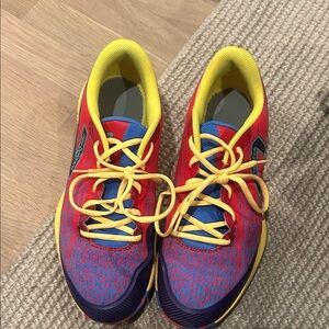 New Balance Kids Sneakers in Red, Blue, and Yellow